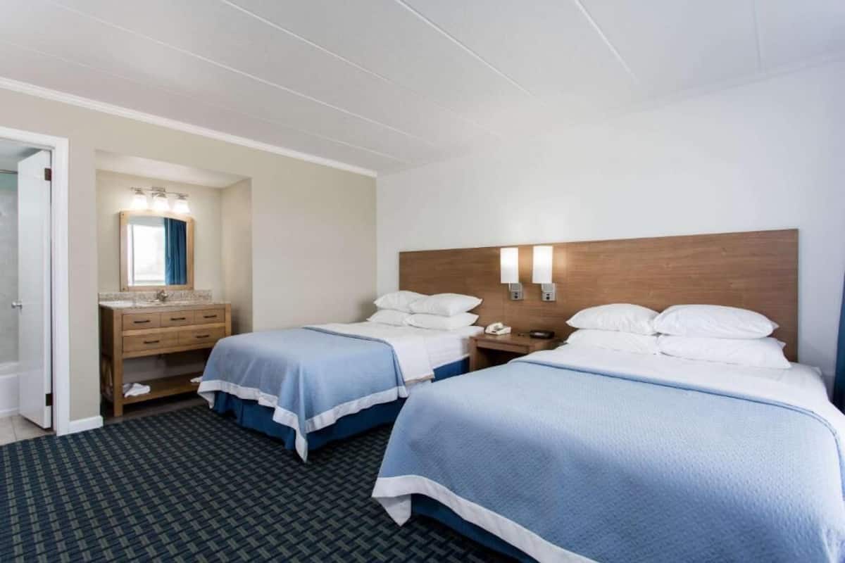 Double Room with Two Double Beds and Street View - Non Smoking | 1 bedroom, in-room safe, iron/ironing board, free WiFi