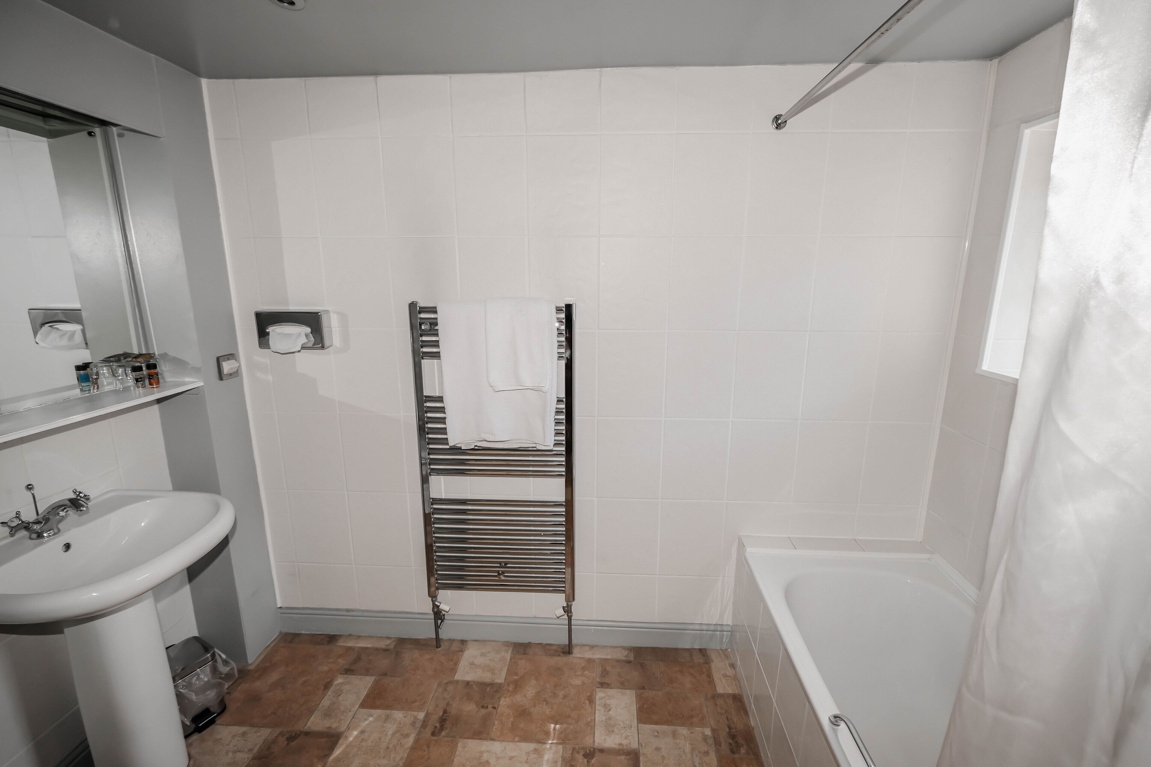 eco-friendly toiletries, hair dryer, towels