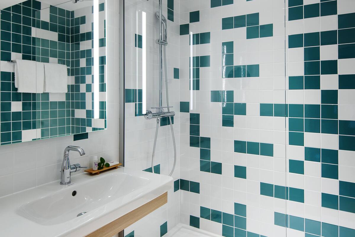 eco-friendly toiletries, hair dryer, bathrobes, slippers