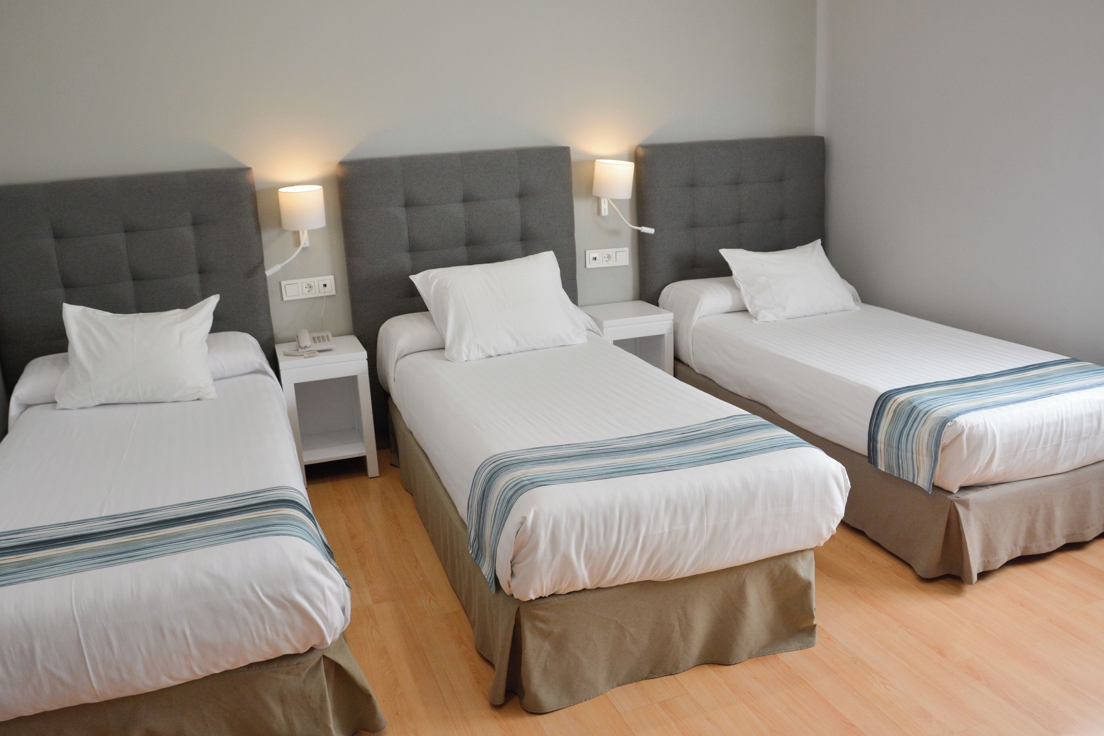 Triple Room | Minibar, in-room safe, desk, free WiFi