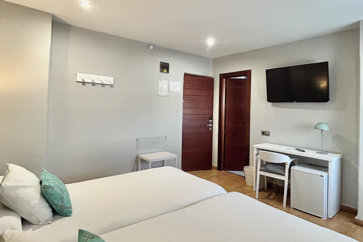 Twin Room | Minibar, in-room safe, desk, free WiFi