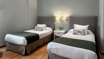 Twin Room | Minibar, in-room safe, desk, free WiFi