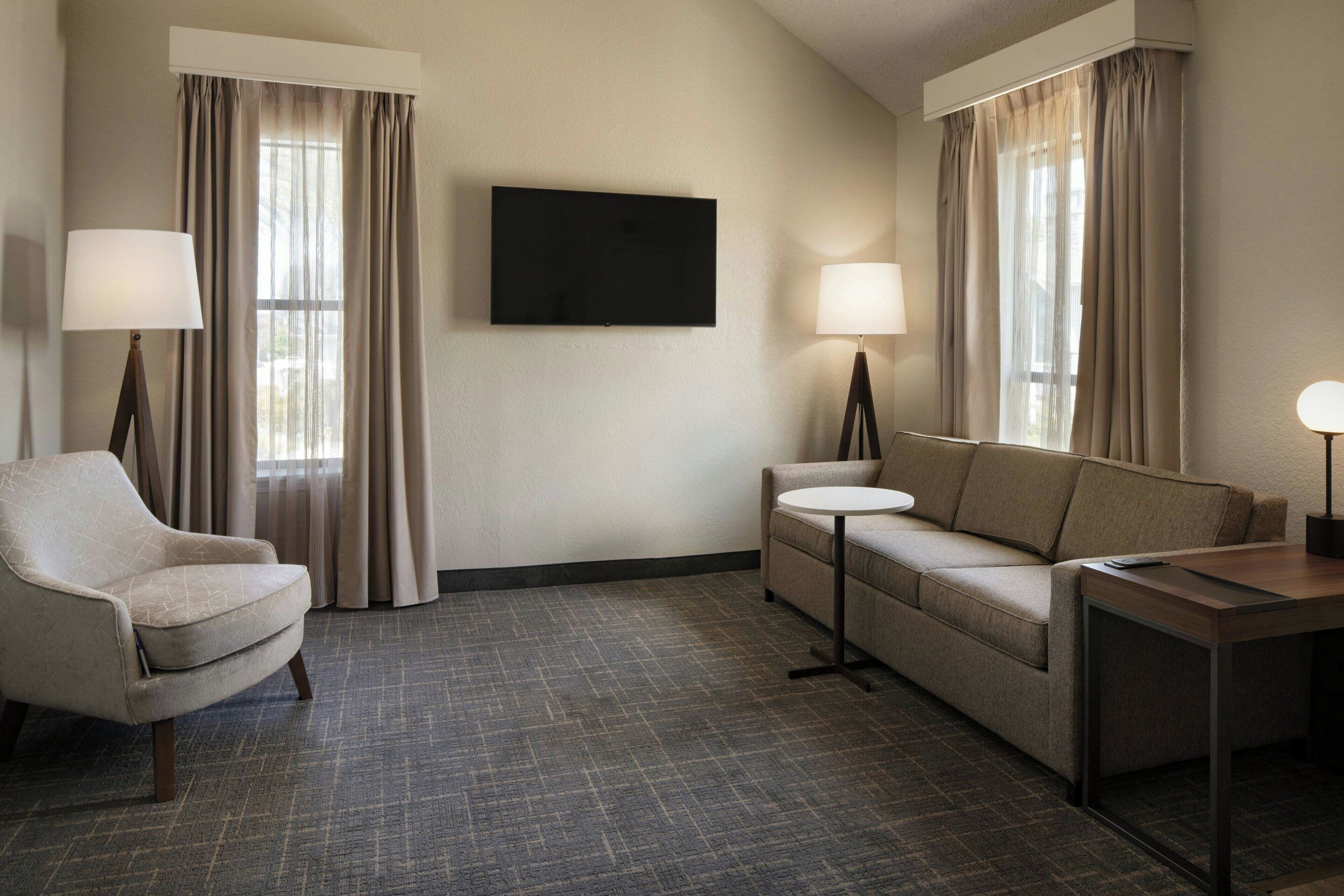 Suite, 1 Bedroom (Second Bed in Loft) | Living room | 32-inch LCD TV with cable channels, TV, pay movies