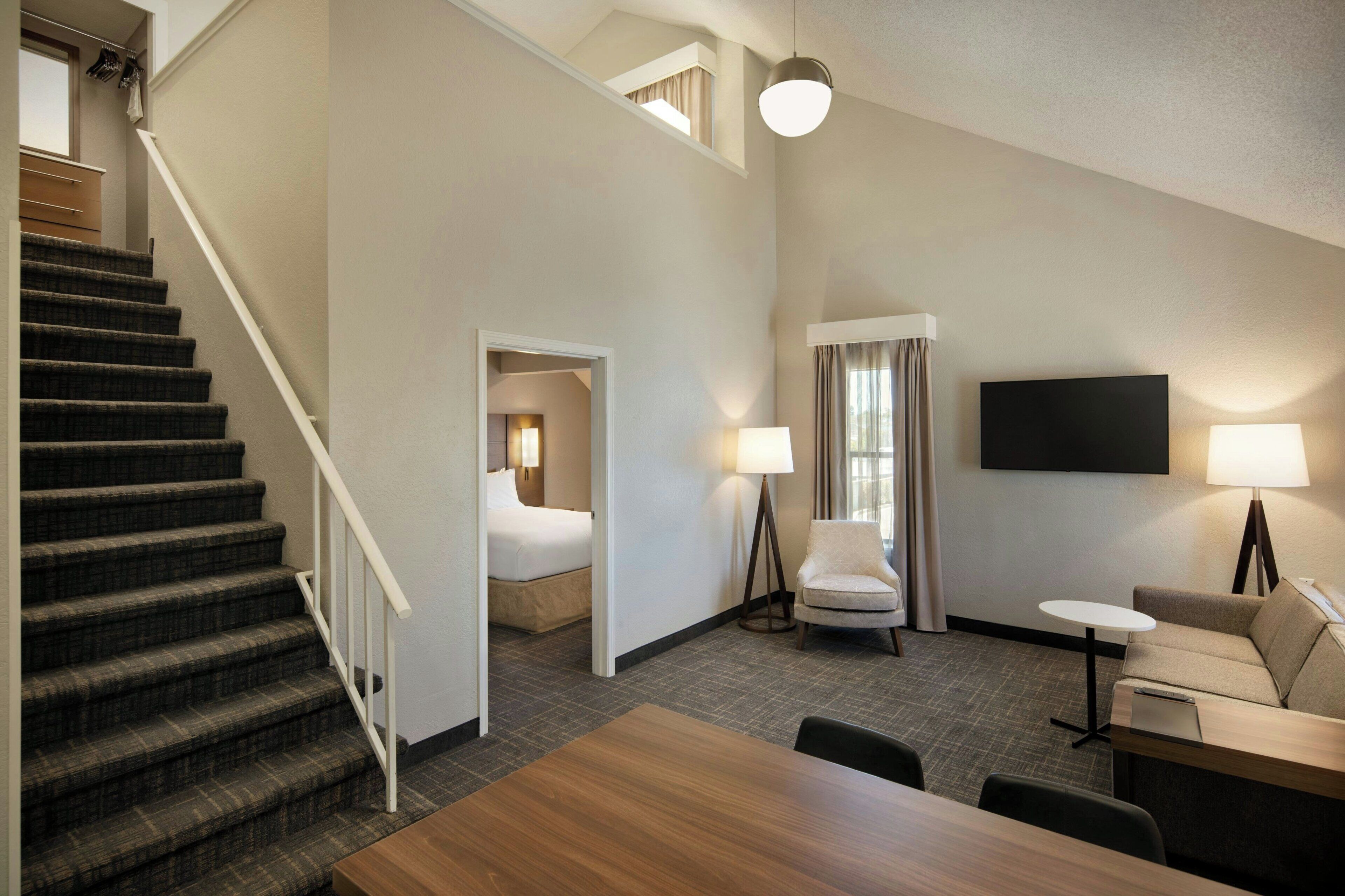 Suite, 1 Bedroom (Second Bed in Loft) | Living area | 32-inch LCD TV with cable channels, TV, pay movies