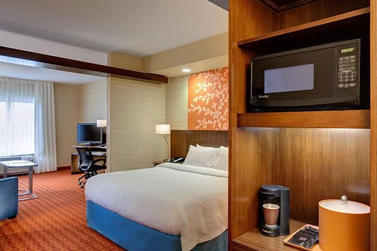 hypo-allergenic bedding, desk, laptop workspace, iron/ironing board