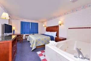 Suite, 1 King Bed (Jacuzzi) | Desk, iron/ironing board, free WiFi, bed sheets