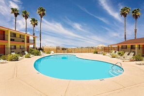 Outdoor pool, open 8 AM to 10:00 PM, pool umbrellas, pool loungers