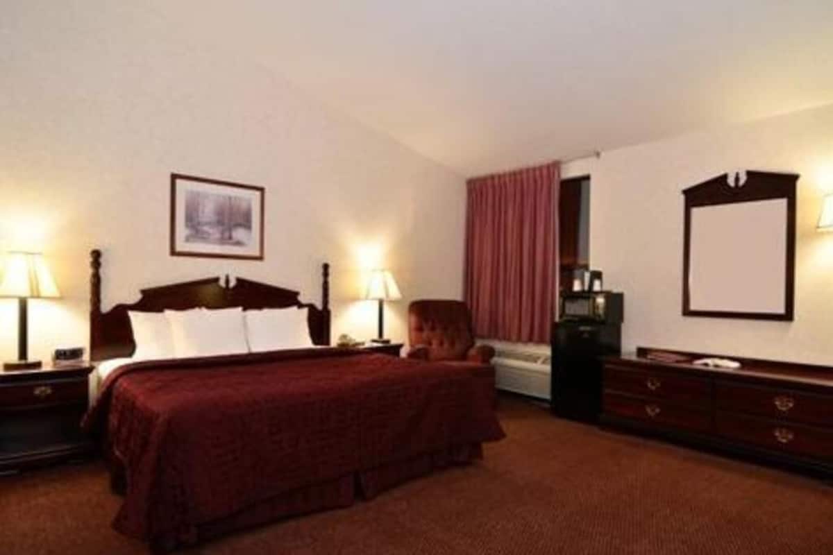 Blackout drapes, soundproofing, iron/ironing board