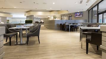 Breakfast, lunch served; local and international cuisine, pool views