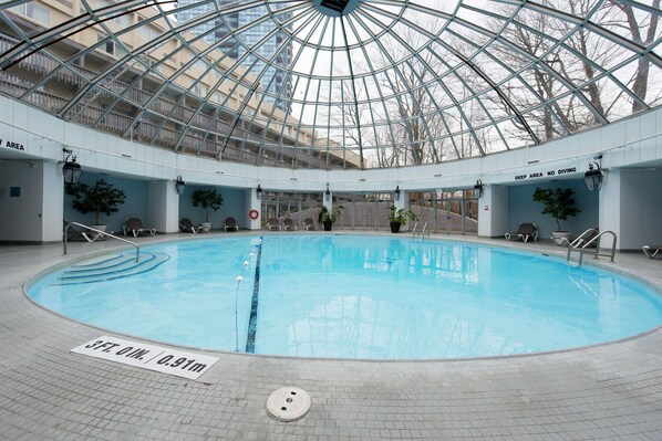 Indoor pool, seasonal outdoor pool, pool umbrellas, pool loungers