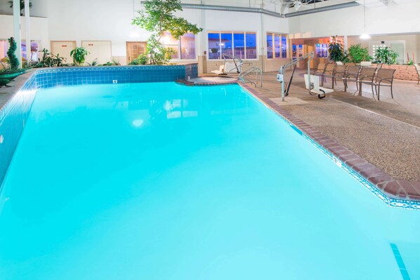 Indoor pool, open 7 AM to 11 PM, pool umbrellas, pool loungers