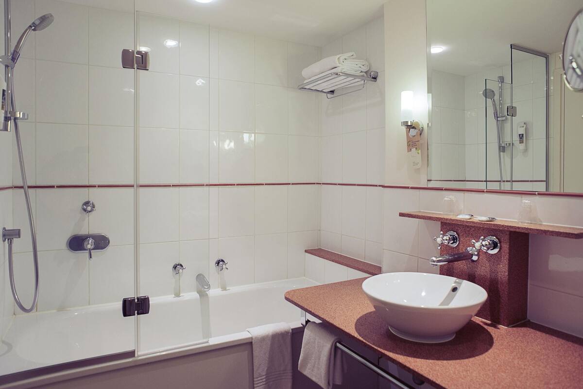 Biancheria da letto di alta qualità, una cassaforte in camera