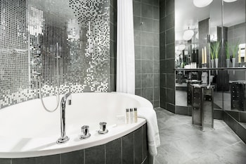 Eco-friendly toiletries, hair dryer, bathrobes, towels at Royalton New York