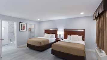 Premium bedding, down duvets, Tempur-Pedic beds, laptop workspace