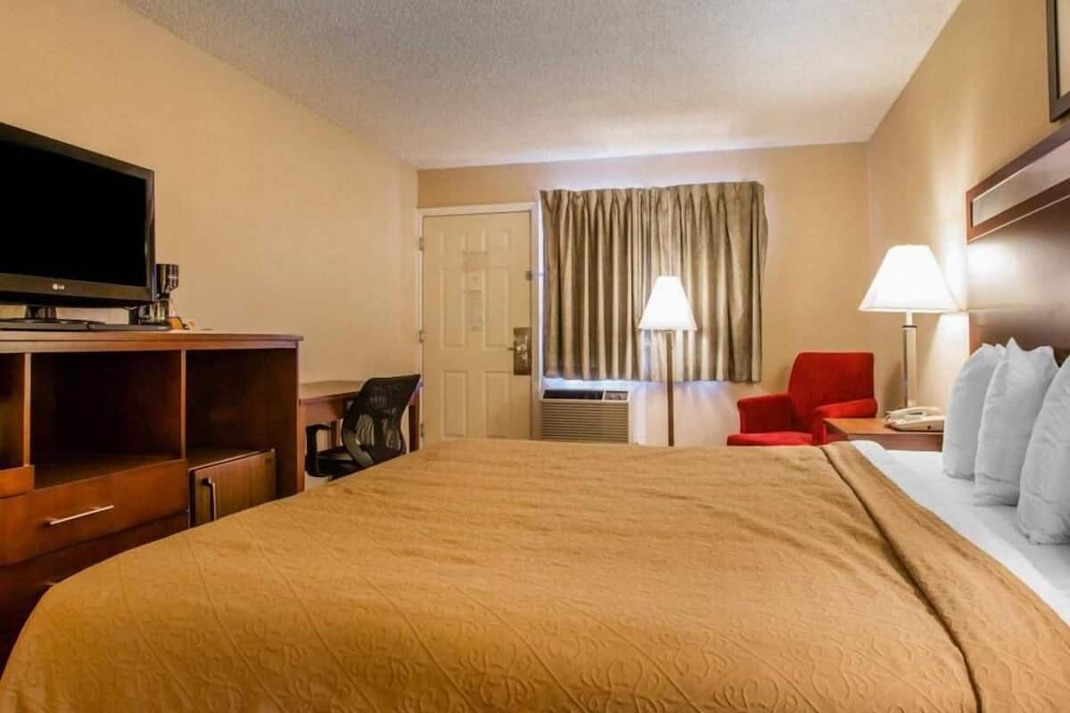 Premium bedding, down comforters, Tempur-Pedic beds, laptop workspace