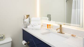 Eco-friendly toiletries, hair dryer, towels