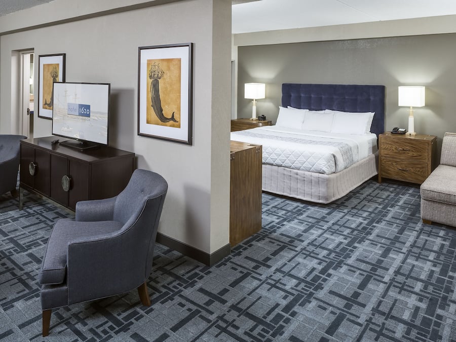 Hypo-allergenic bedding, desk, laptop workspace, blackout curtains