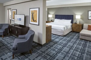 Suite, Balcony, Pool View | 1 bedroom, hypo-allergenic bedding, desk, laptop workspace