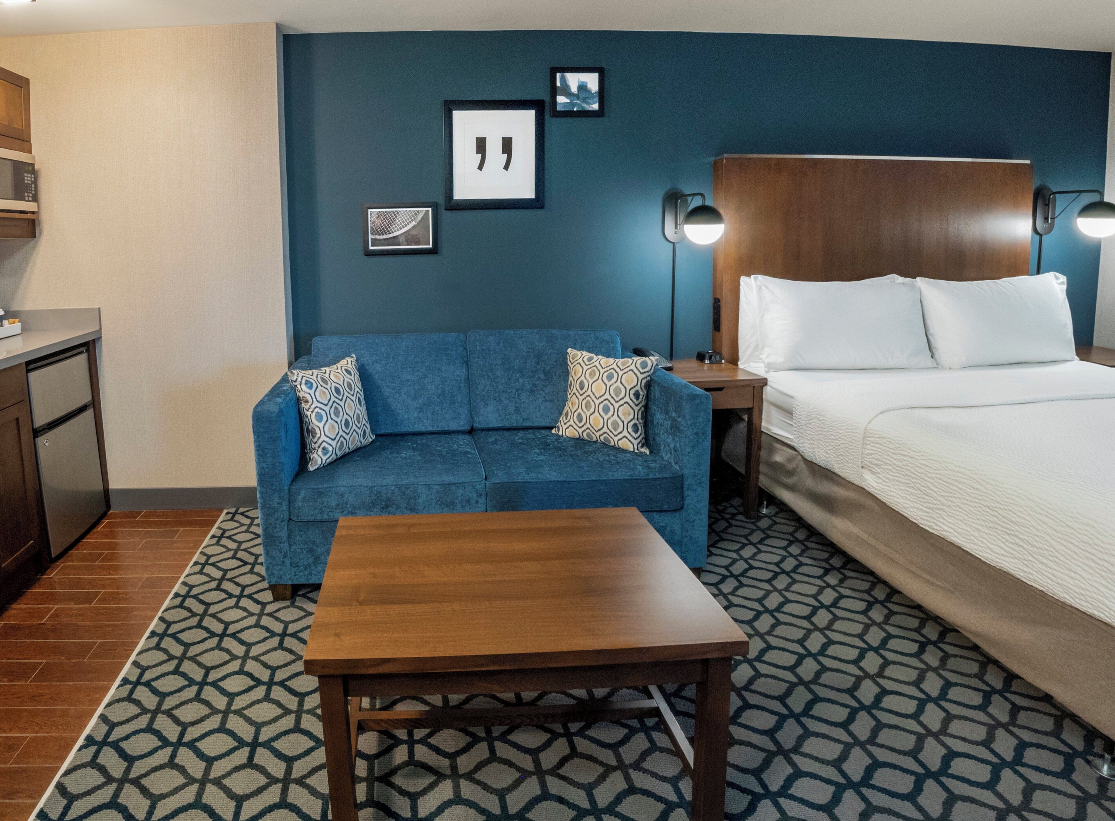 Hypo-allergenic bedding, down comforters, desk, laptop workspace