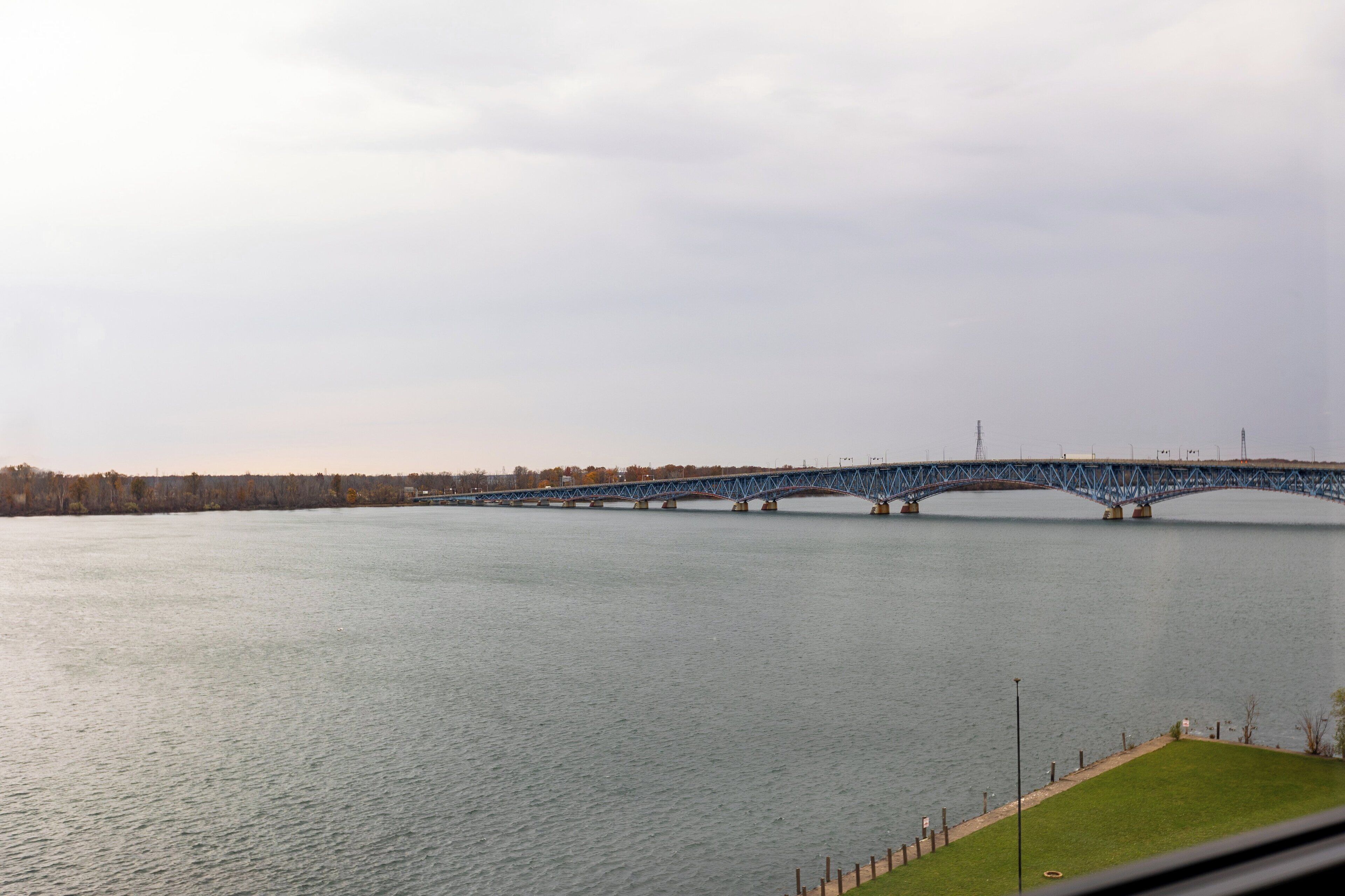 Hypo-allergenic bedding, down duvets, desk, laptop workspace