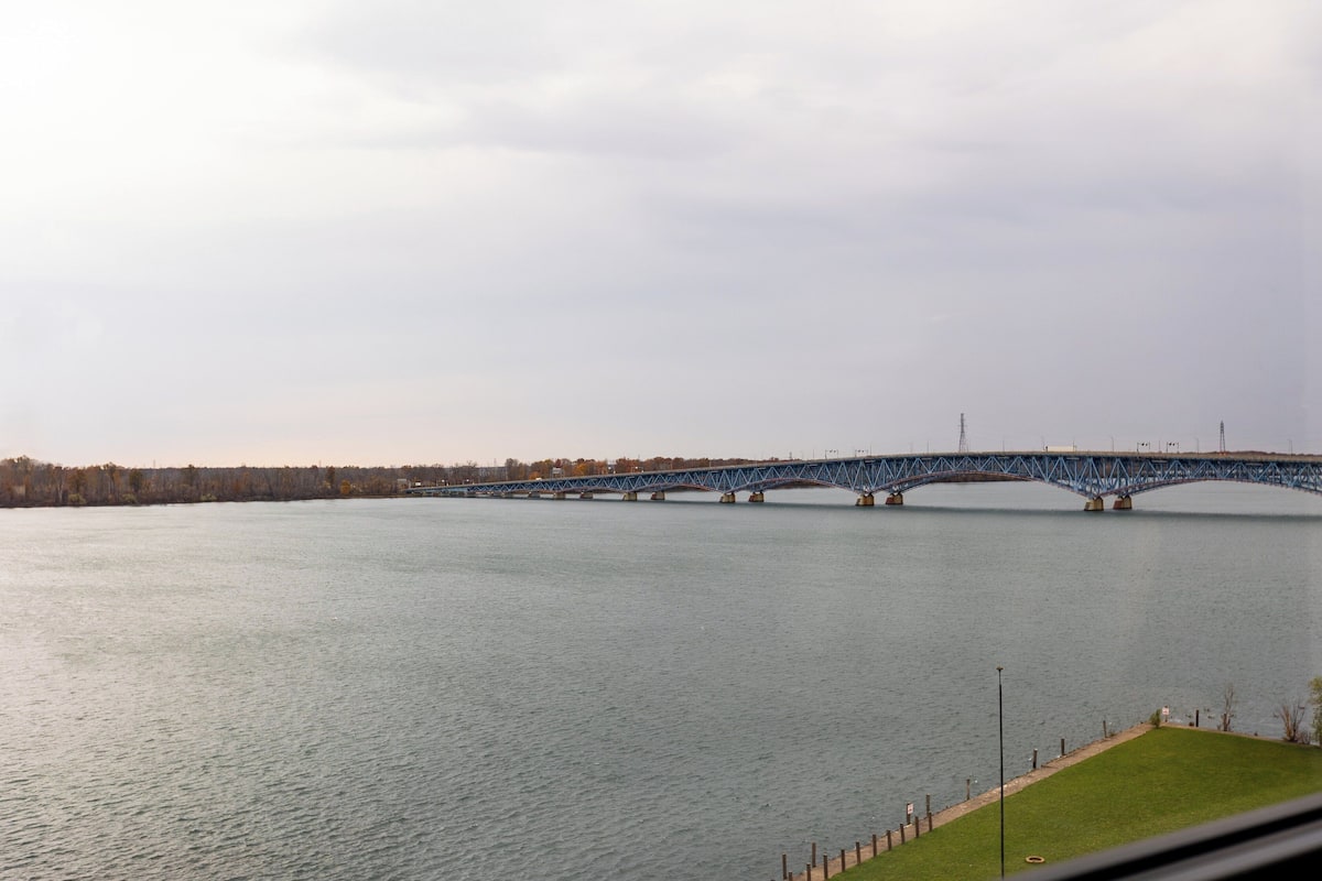 Hypo-allergenic bedding, down duvets, desk, laptop workspace