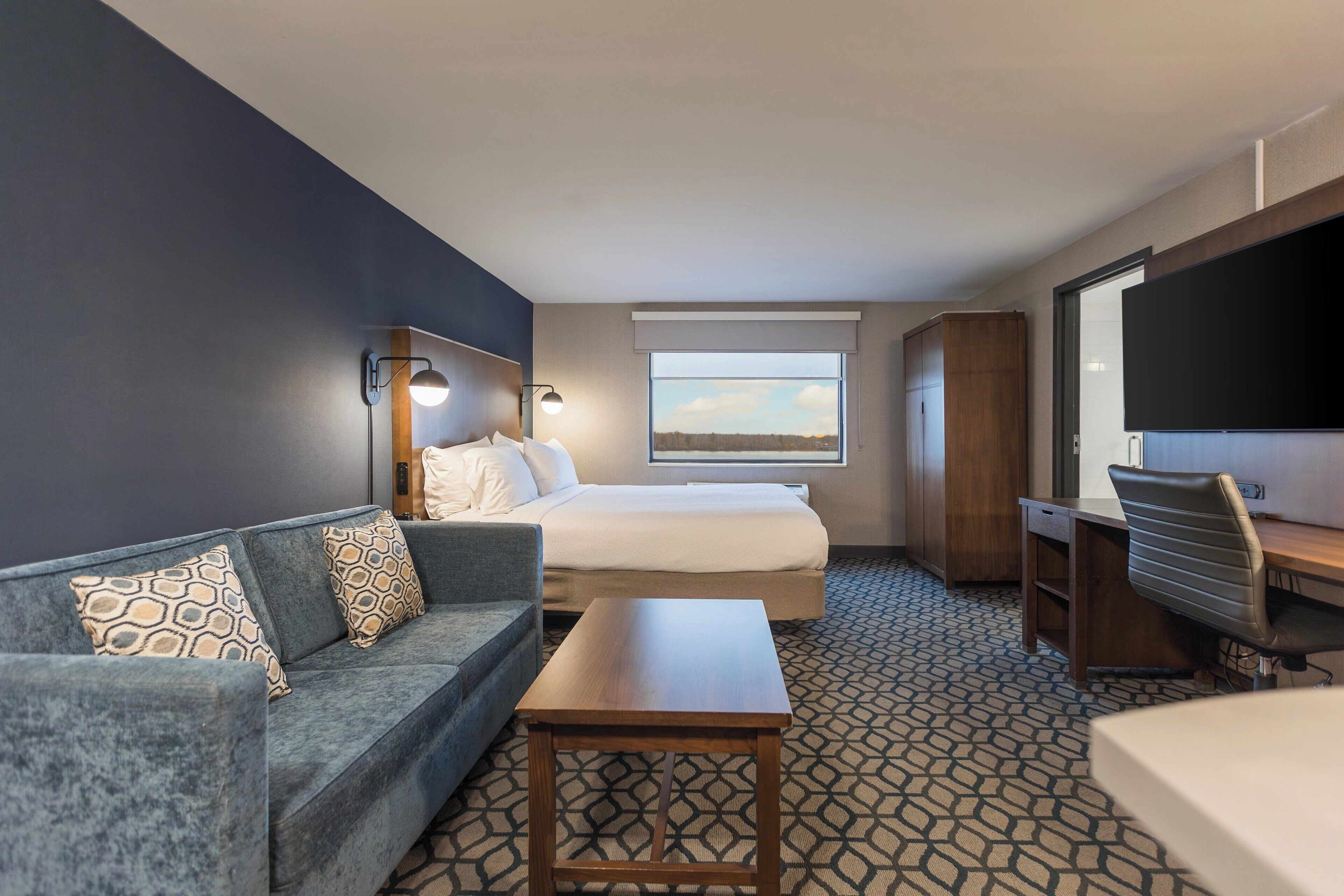Suite, 1 Bedroom, River View | Hypo-allergenic bedding, down comforters, desk, laptop workspace