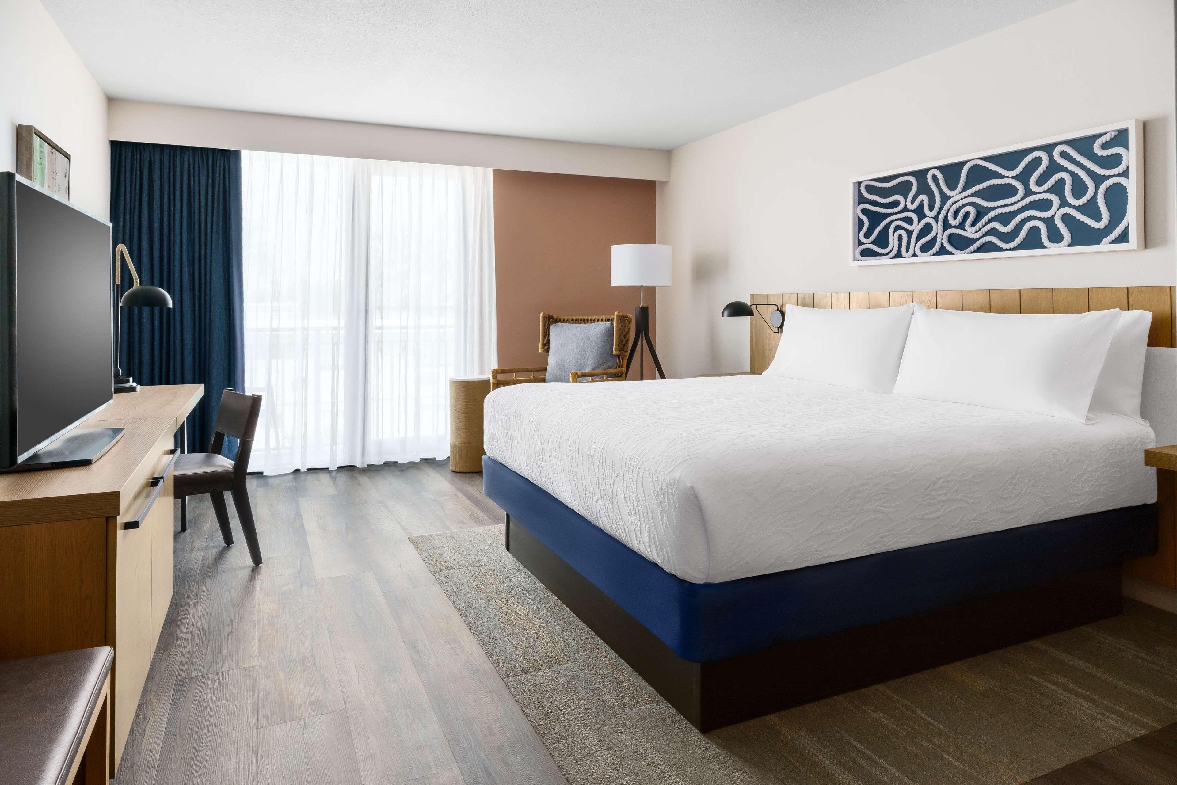 in-room safe, desk, blackout curtains, iron/ironing board