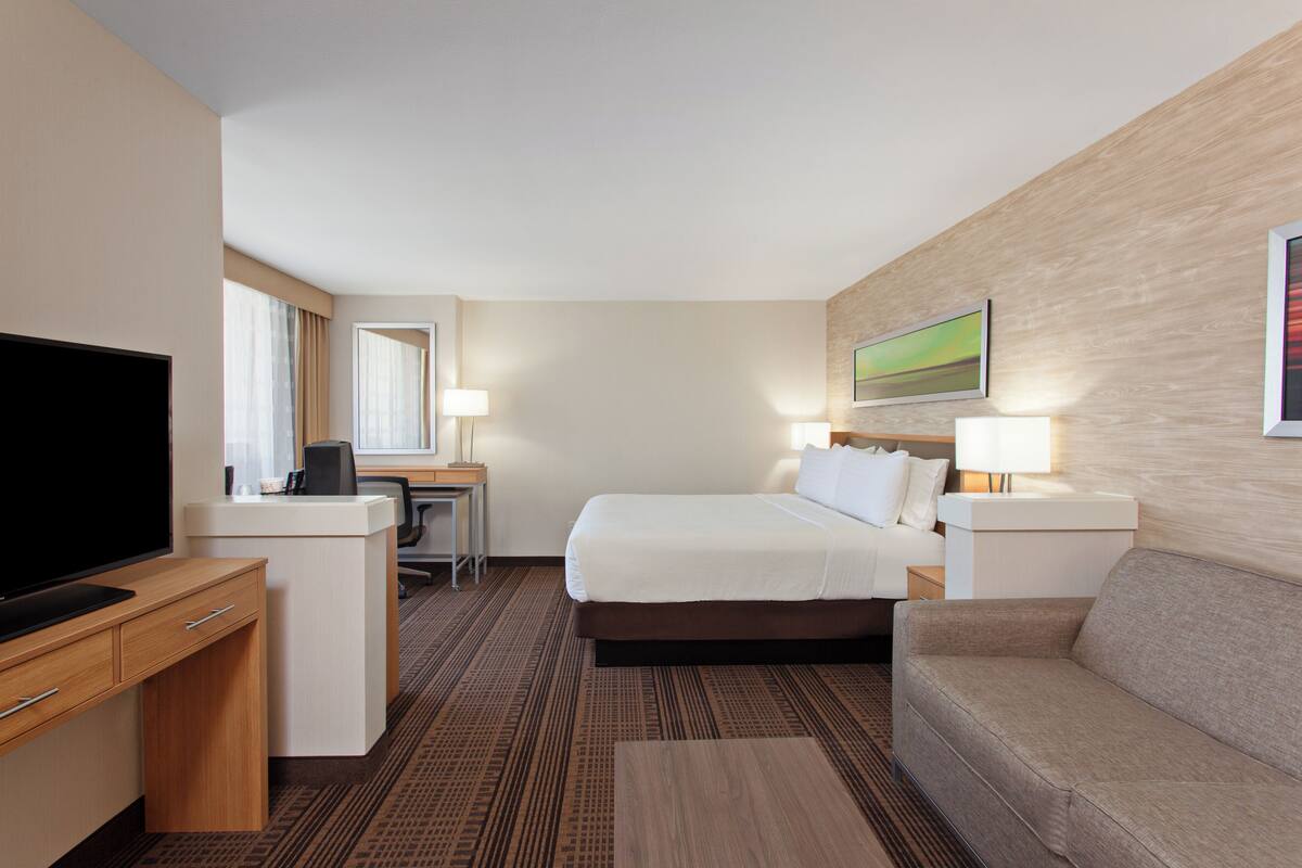 Suite, 1 King Bed | In-room safe, desk, laptop workspace, iron/ironing board