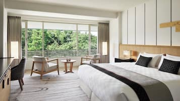 Premium bedding, down comforters, desk, laptop workspace