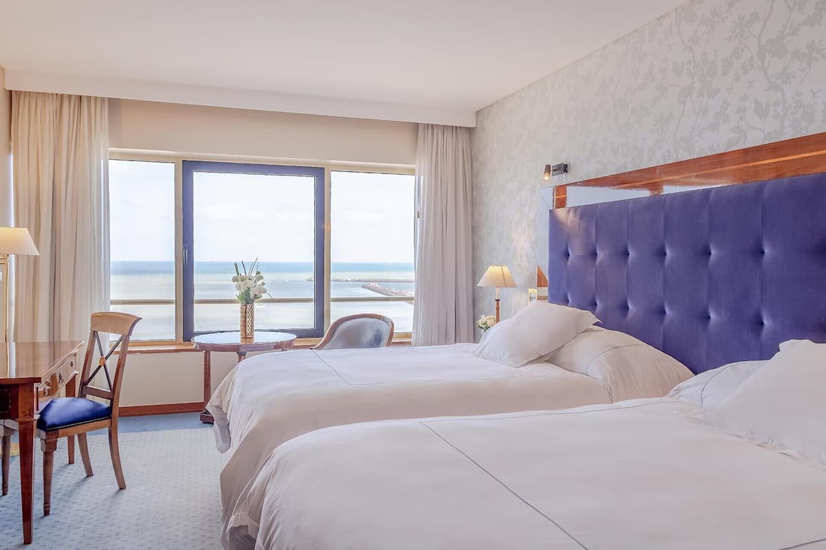 frette italian sheets, premium bedding, down duvets, minibar