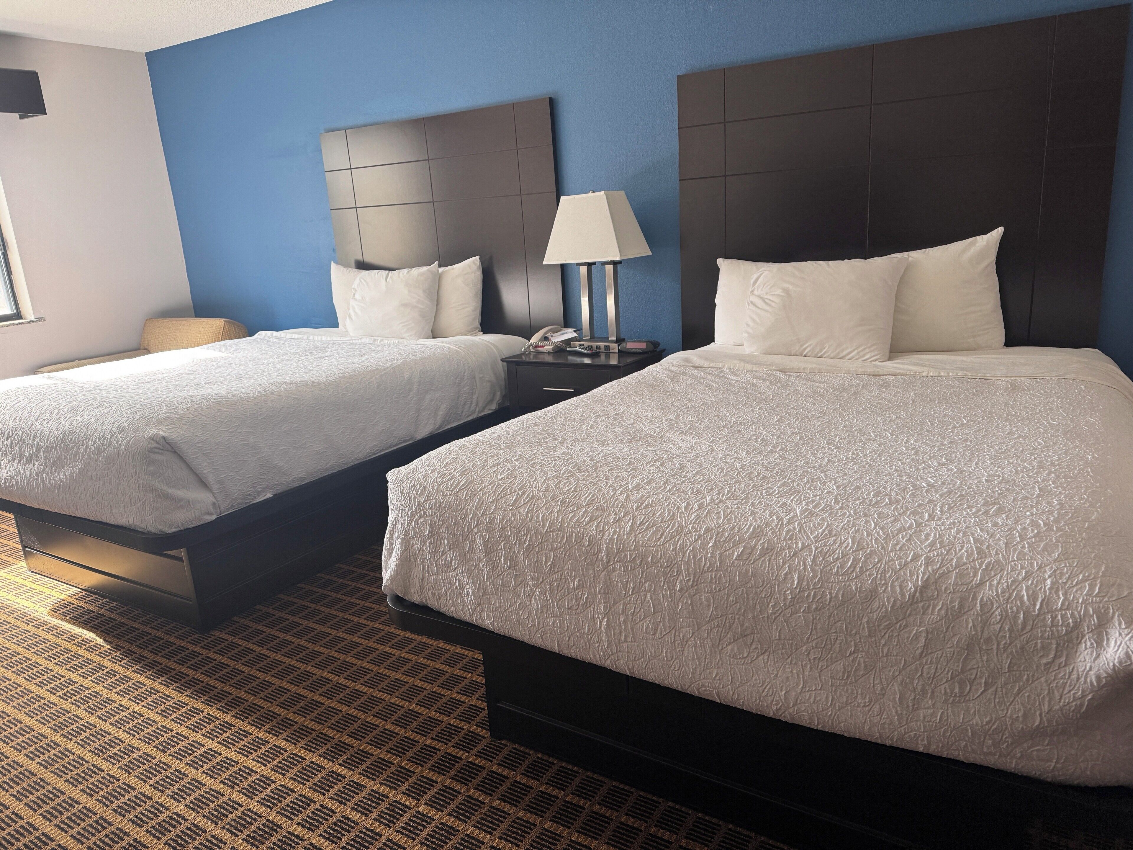 Desk, blackout drapes, free cribs/infant beds, rollaway beds