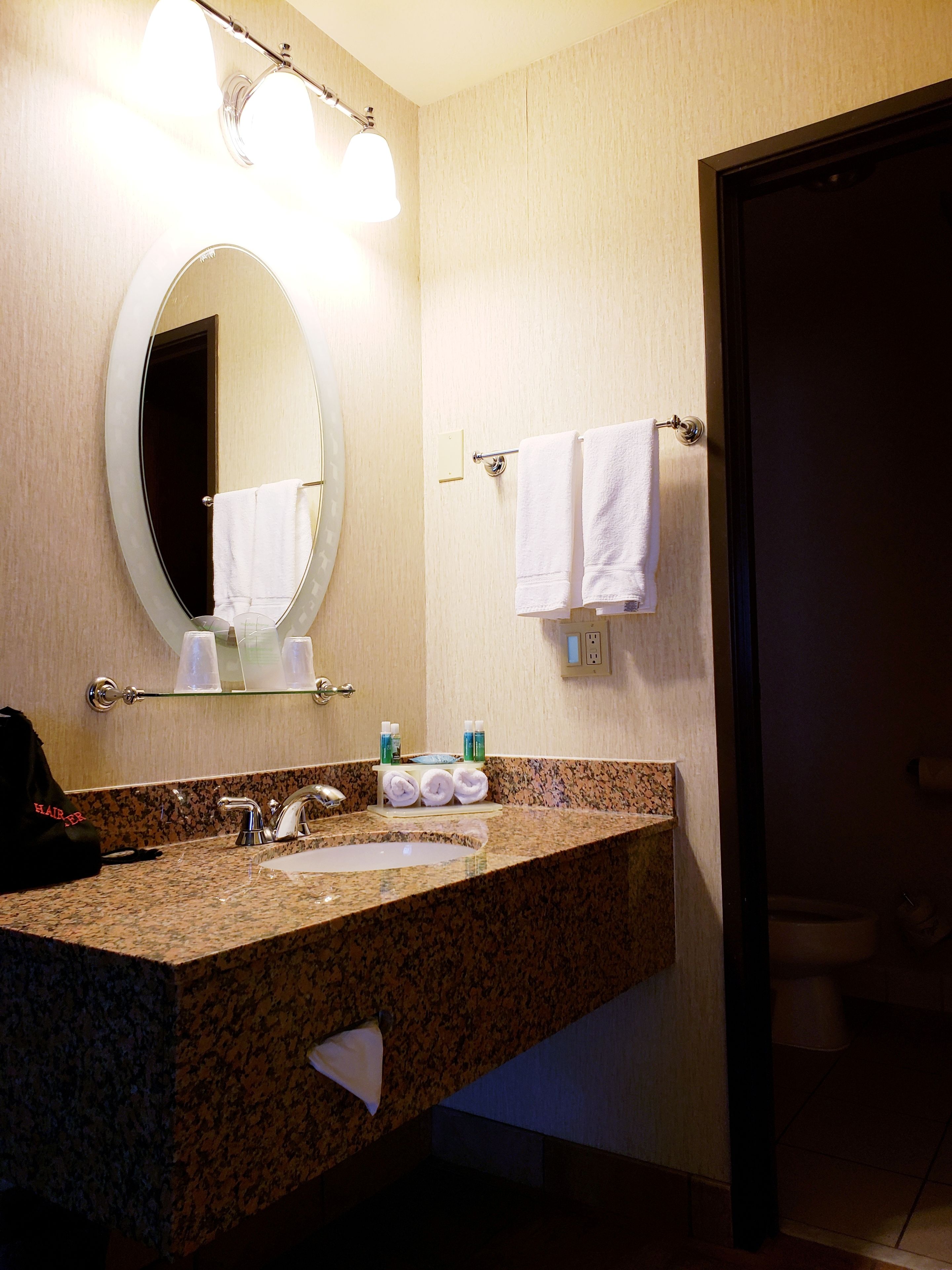 combined shower/bathtub, eco-friendly toiletries, hair dryer, towels