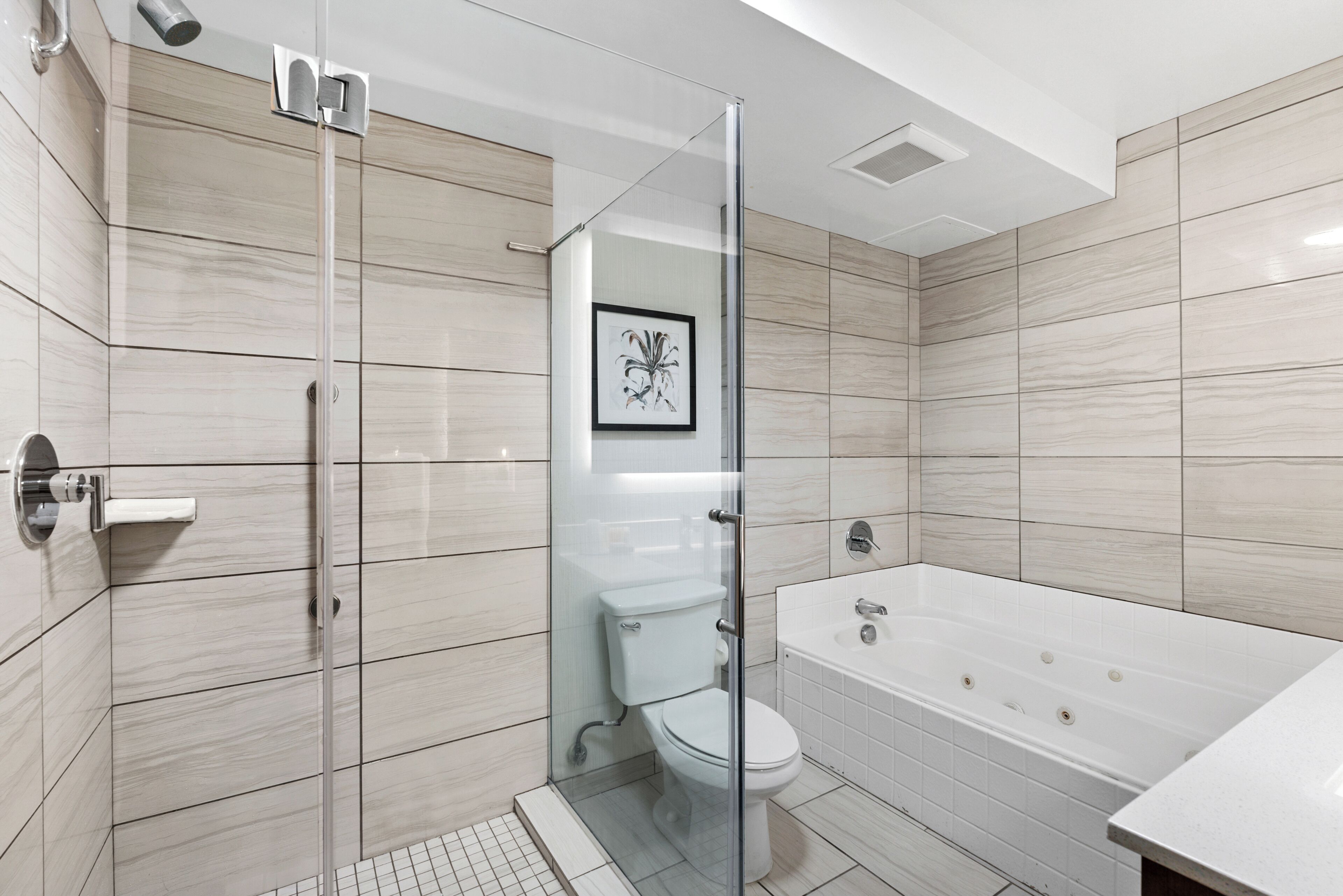 standard double room, 2 queen beds | bathroom | combined shower/bathtub, free toiletries, hair dryer, towels