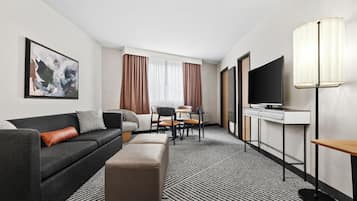 Suite, 1 Bedroom | Living area | 49-inch LCD TV with cable channels, TV
