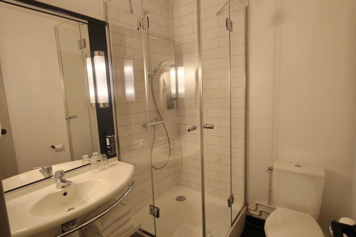 shower, eco-friendly toiletries, towels
