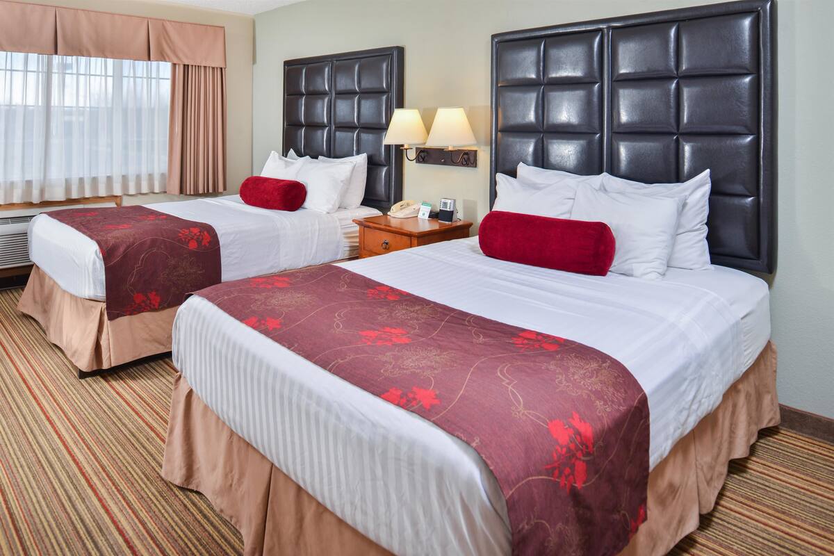 suite, 2 queen beds, non smoking, refrigerator & microwave | 1 bedroom, premium bedding, in-room safe, blackout curtains