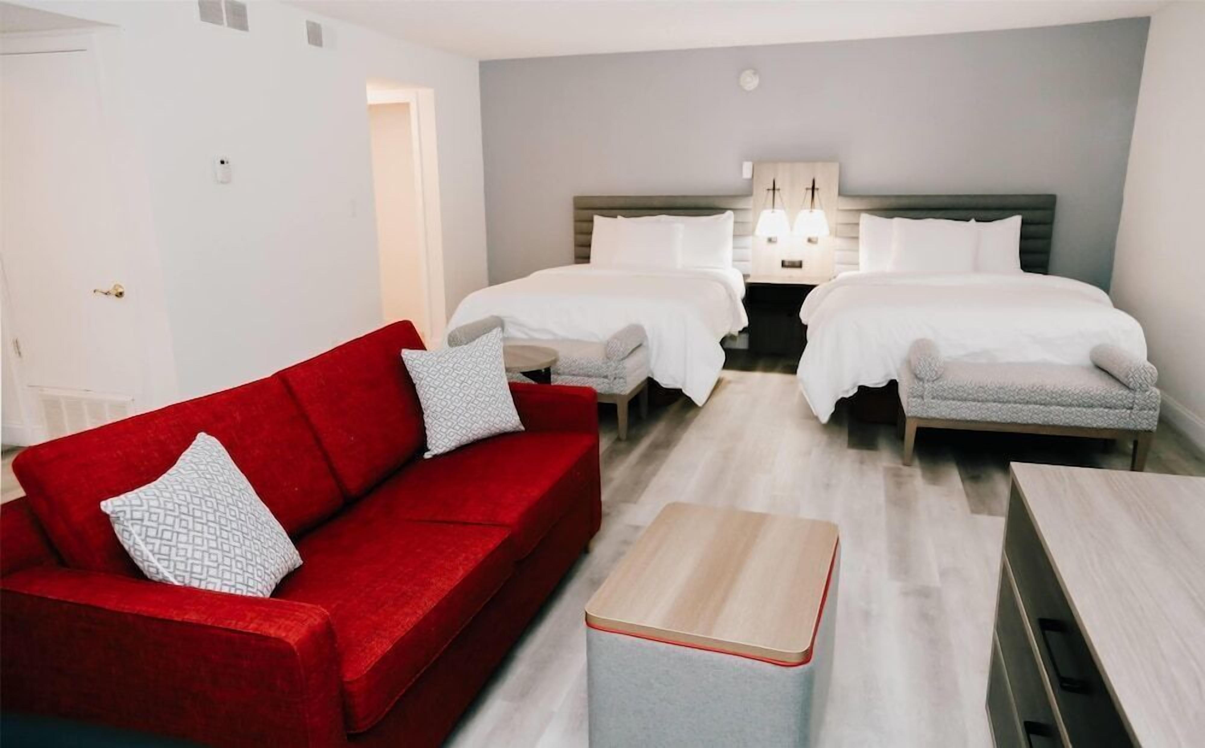 Premium bedding, pillow-top beds, desk, blackout curtains