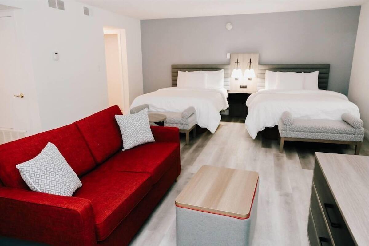 Premium bedding, pillow-top beds, desk, blackout curtains