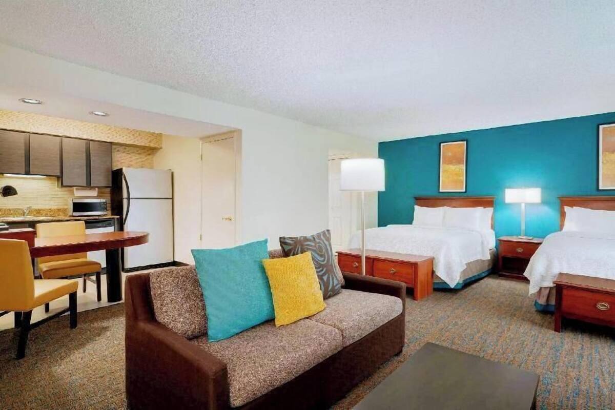 Premium bedding, pillow-top beds, desk, blackout curtains