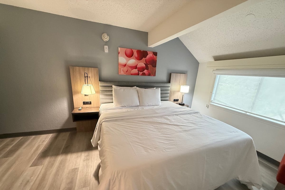 Premium bedding, pillow-top beds, desk, blackout curtains