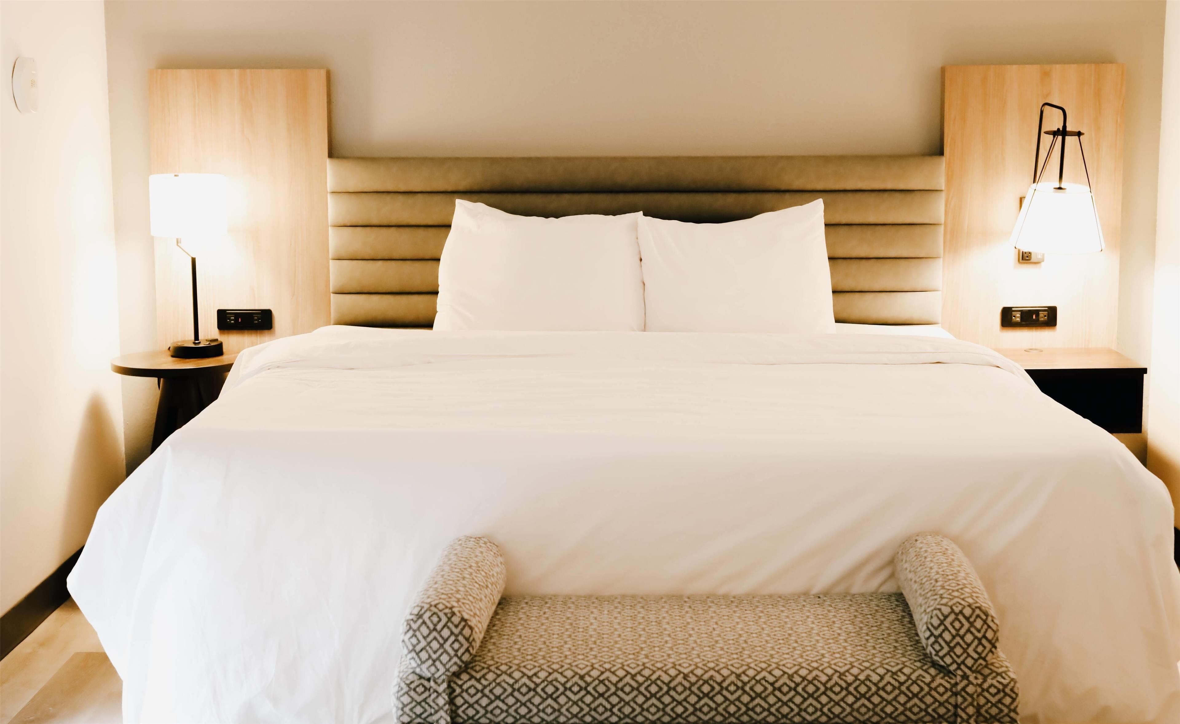 Premium bedding, pillowtop beds, desk, blackout drapes