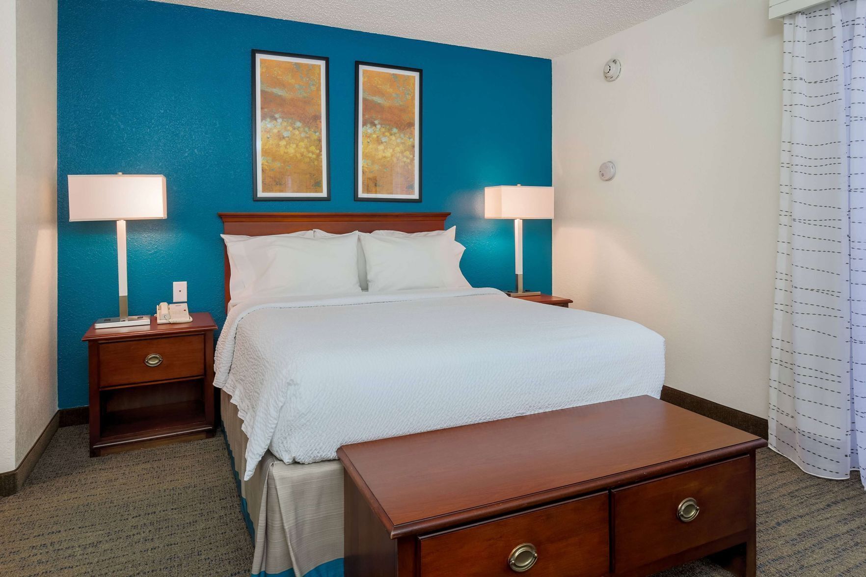 Premium bedding, pillow-top beds, desk, blackout curtains