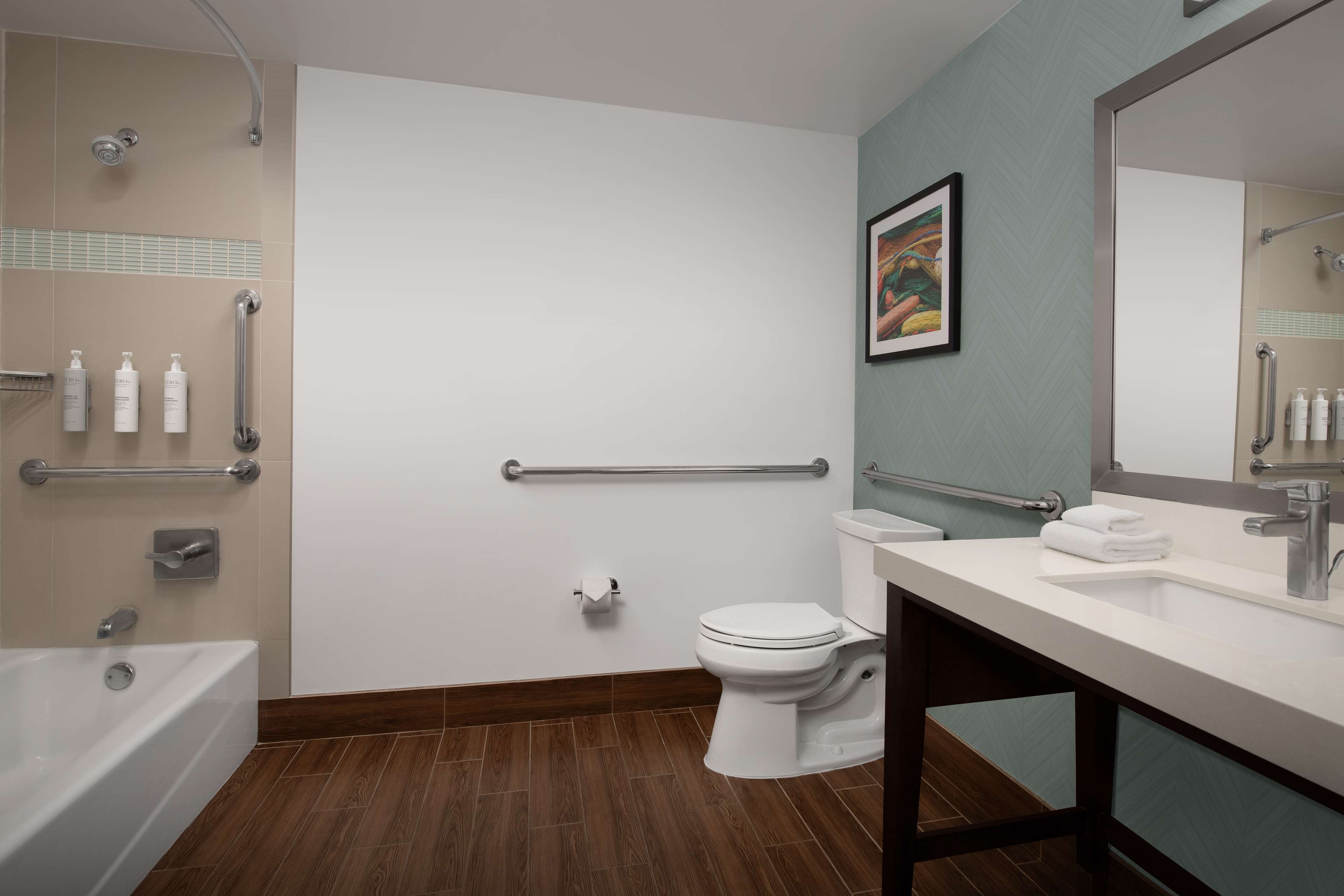 eco-friendly toiletries, hair dryer, towels, soap