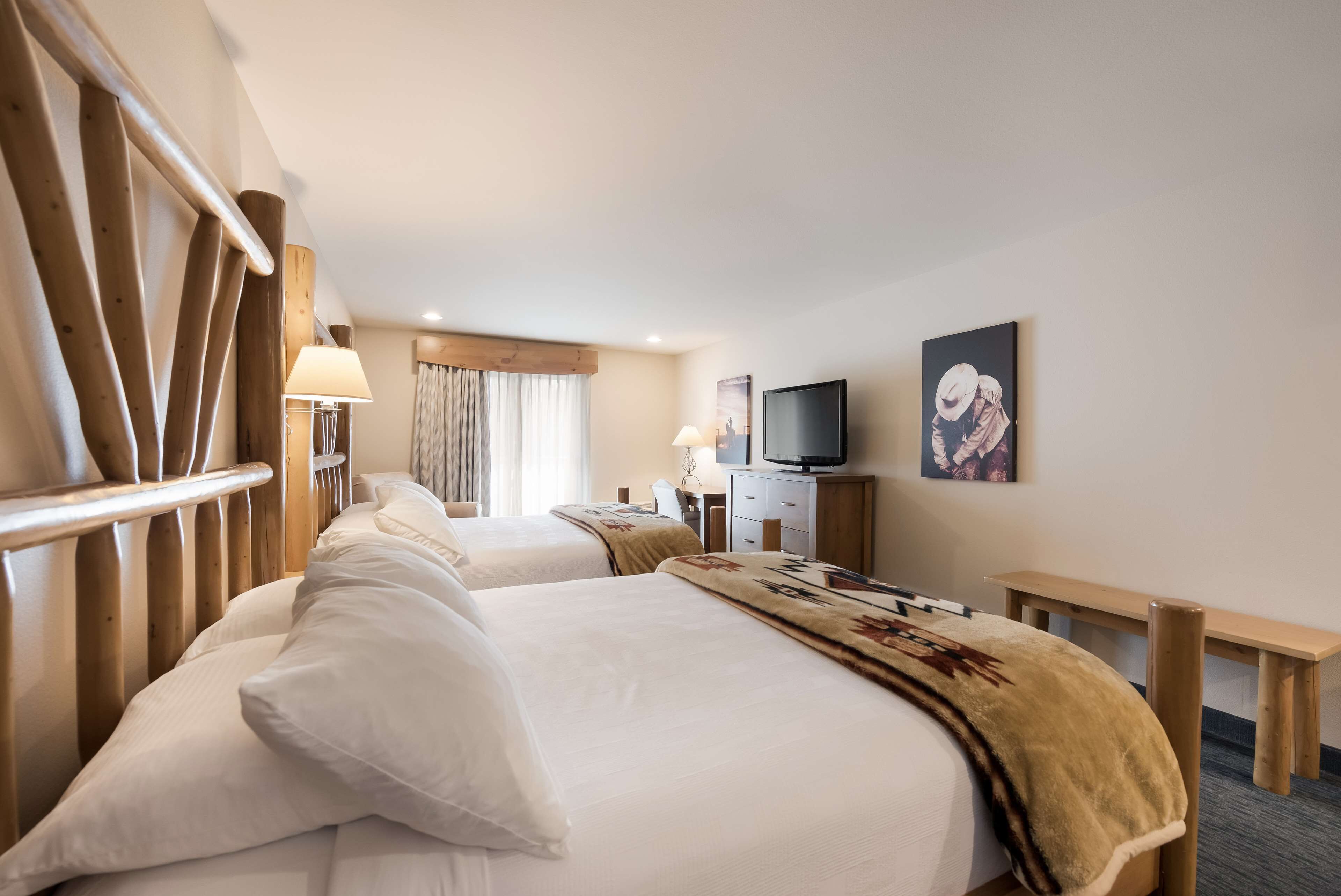 standard room, 2 queen beds, non smoking, refrigerator & microwave | 1 bedroom, pillow-top beds, blackout curtains, iron/ironing board