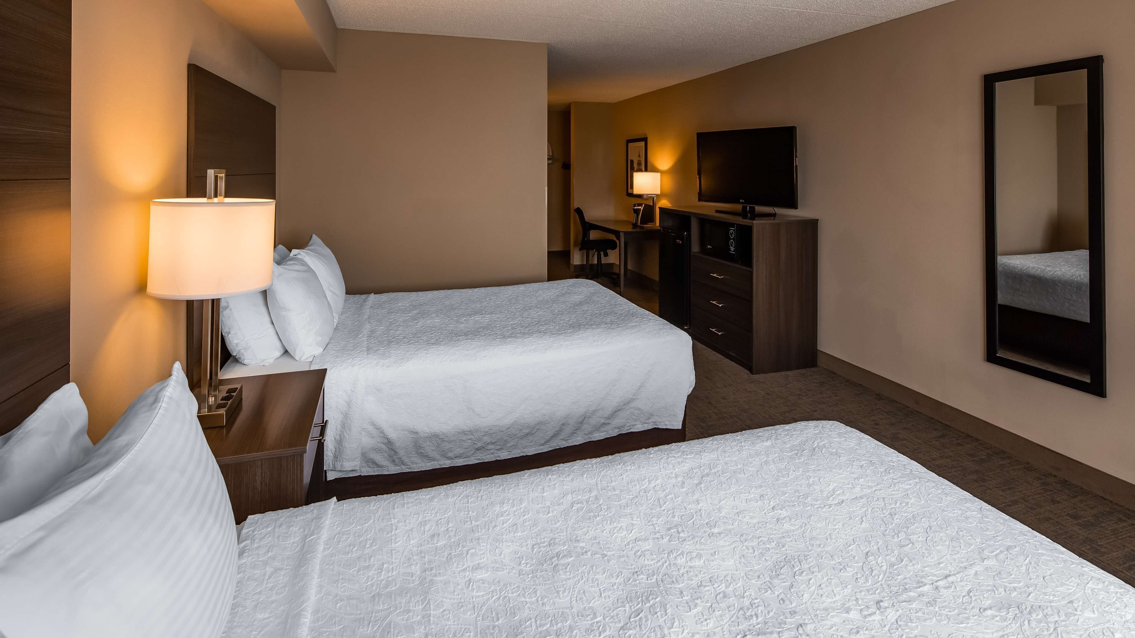 suite, 2 double beds, non smoking, refrigerator & microwave | 1 bedroom, desk, laptop workspace, iron/ironing board