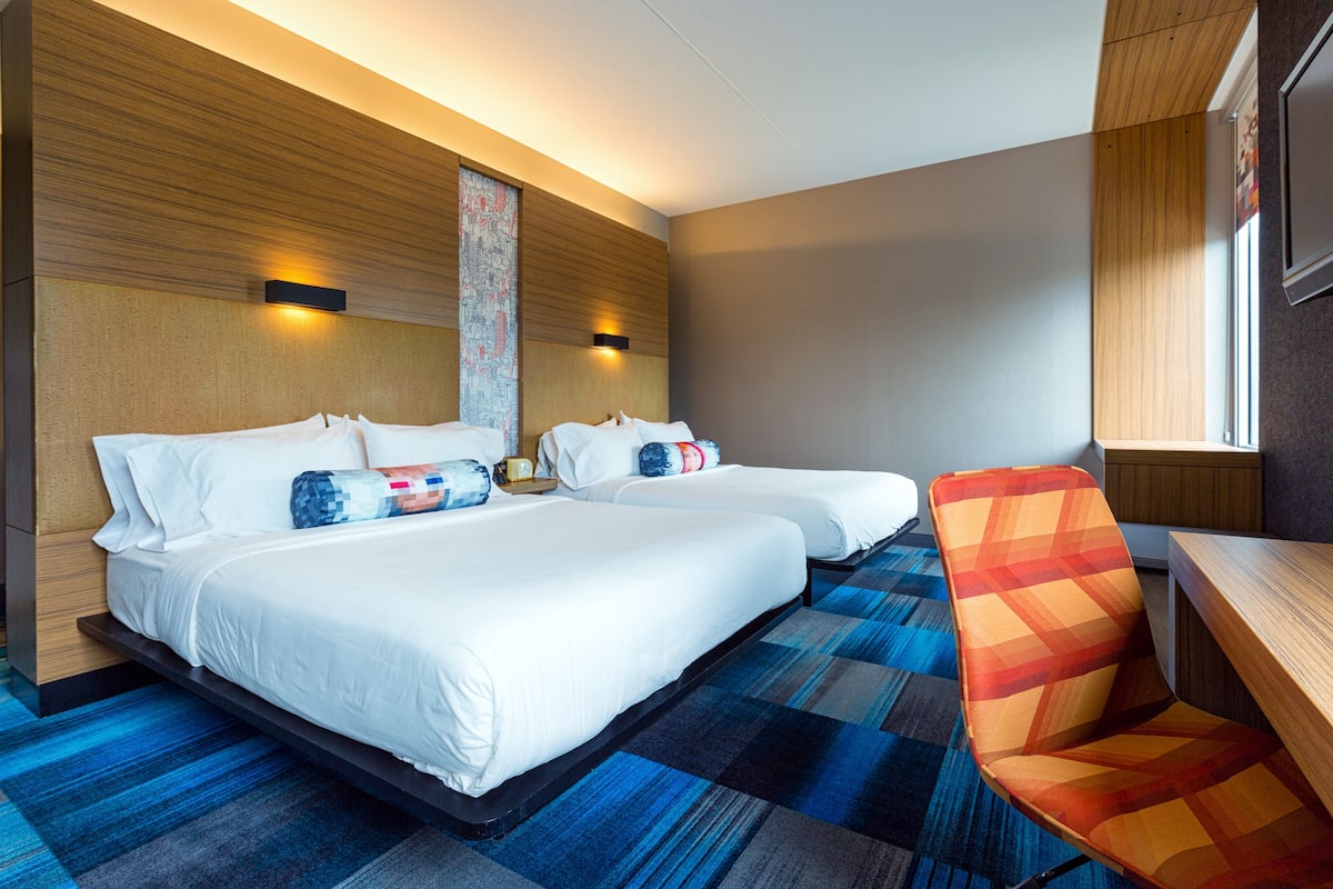 hypo-allergenic bedding, down duvets, pillow-top beds, in-room safe