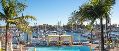 Outdoor pool, free cabanas, pool umbrellas