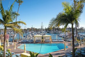 Outdoor pool, free cabanas, pool umbrellas