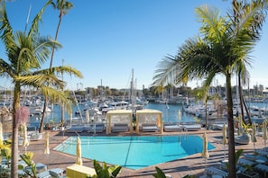 Outdoor pool, free cabanas, pool umbrellas