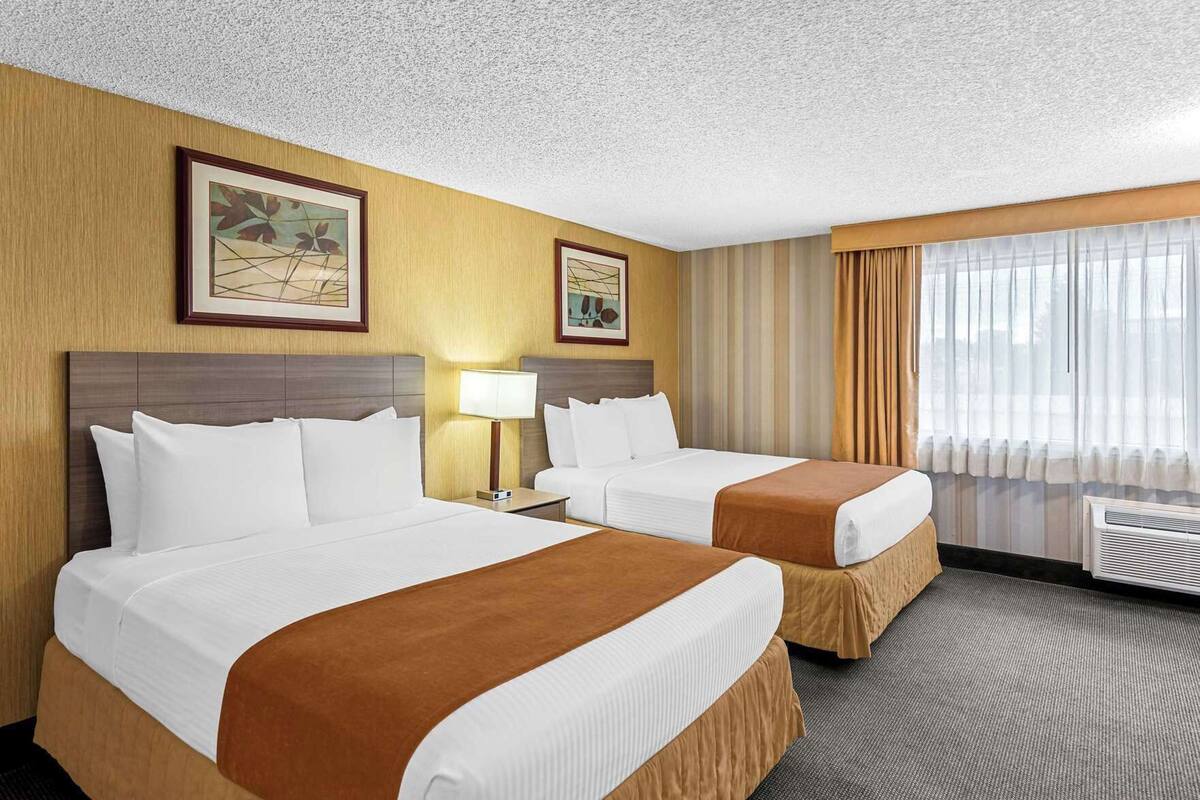 Premium bedding, pillowtop beds, desk, blackout drapes